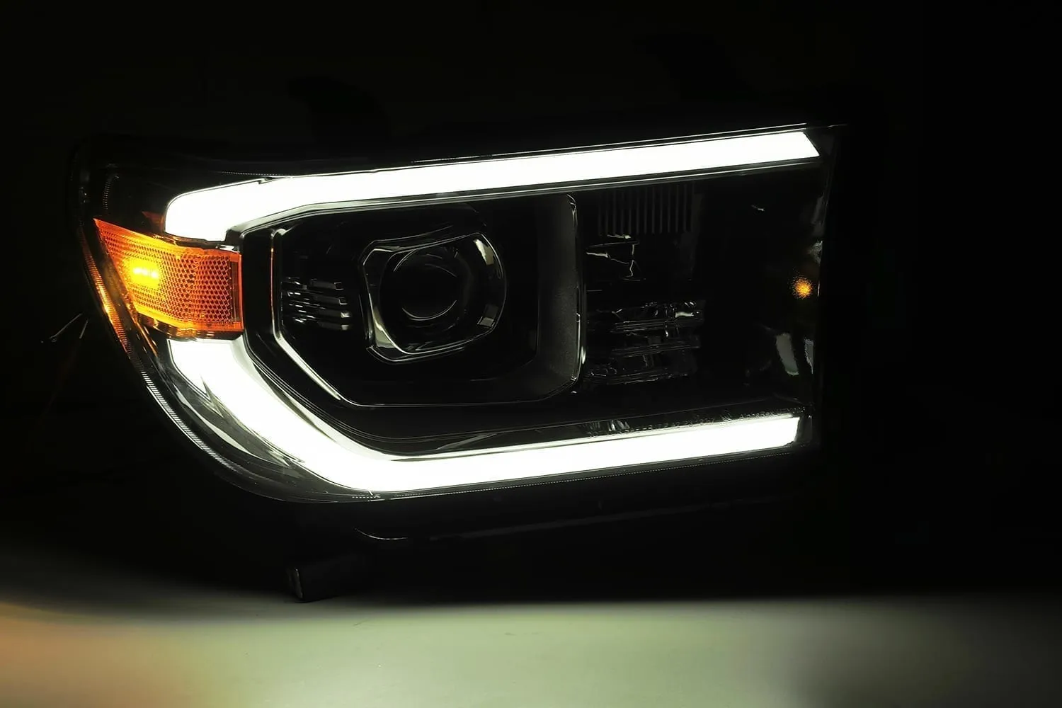 AlphaRex Dual LED Projector Headlights Toyota Sequoia [LUXX Series - DRL Light Tube] (08-13) Alpha-Black / Black / Chrome